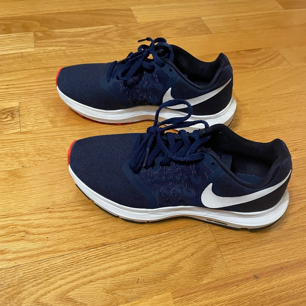 Navy and orange Nike shoes